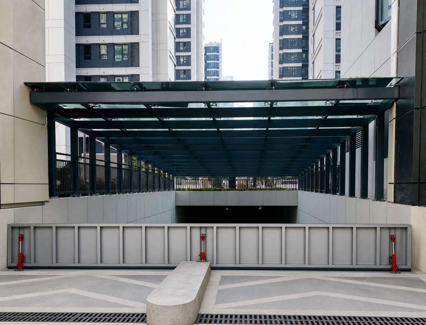 Automatic flood barrier raised across the entrance ramp of an underground parking garage