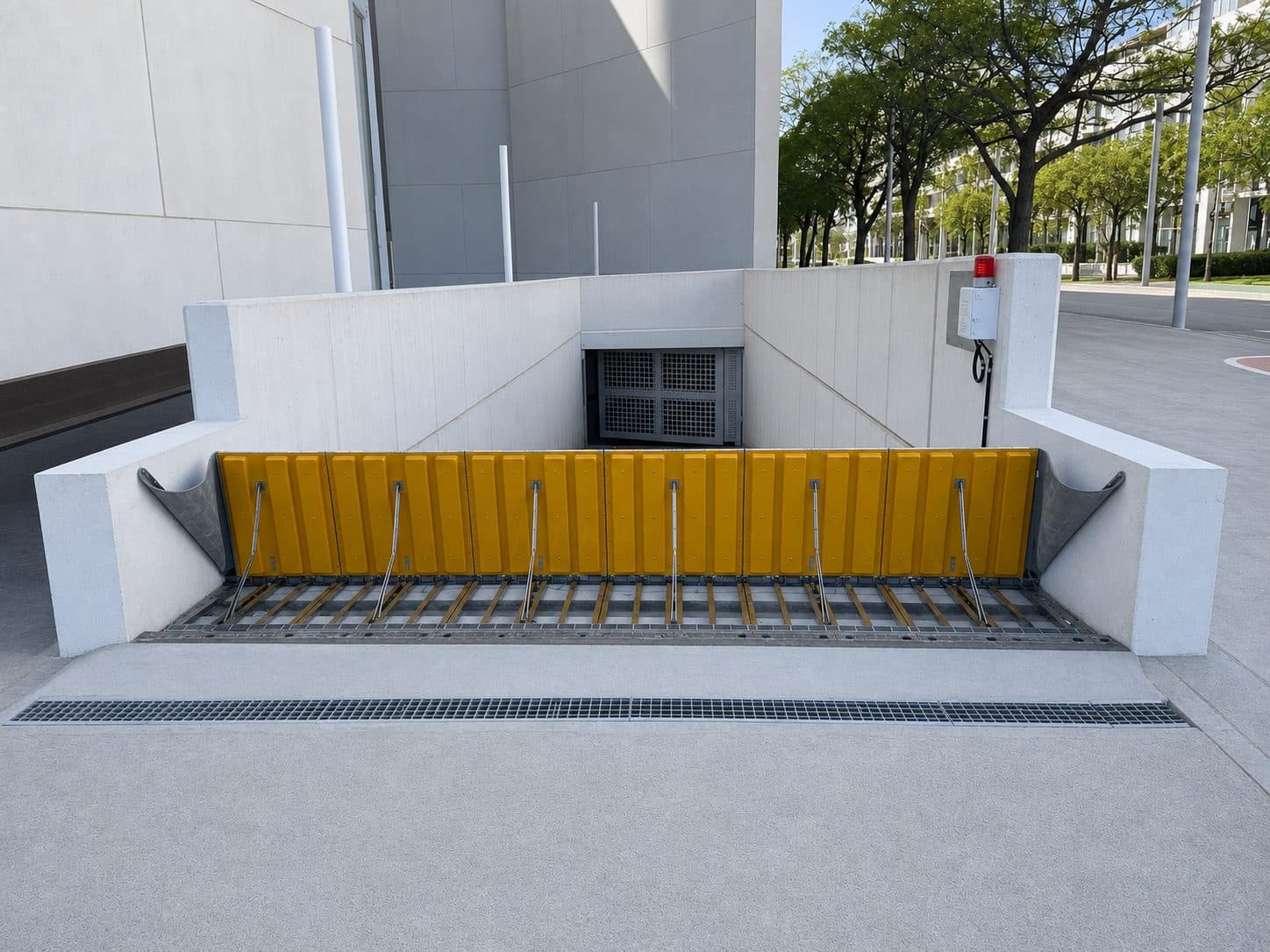 Hydrodynamic passive flood barrier at an underground parking entrance