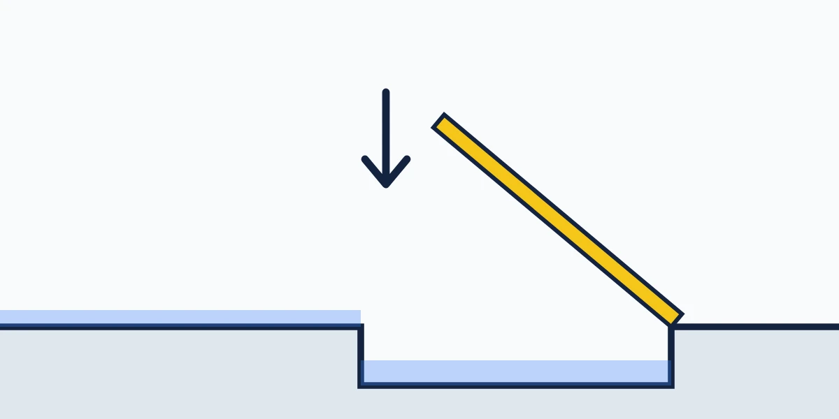 Section of a self-closing flood barrier lowering under its own weight as the floodwater recedes